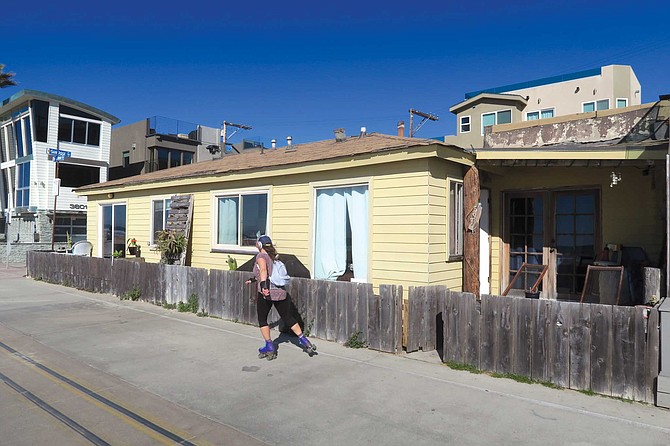 A good number of the homes that line the Boardwalk and Bayfront Walk on the other side of the isthmus are recent builds or remodels, some with clean, modern styling. But, a surprisingly large number of homes have been there for at least 30 years, and some for much longer.