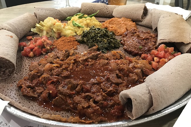 Injera, fermented bread, anchors almost every Ethiopian dish, like this veggie combo.