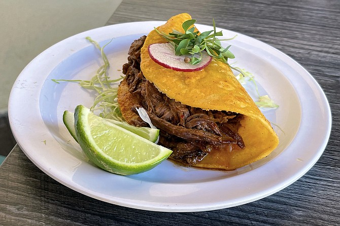 A birria taco, purchased a la carte for $6