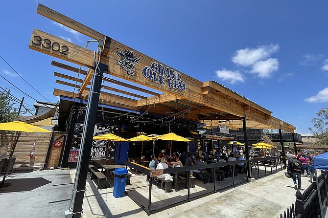 A remodeled outdoor BBQ restaurant, now open once again in North Park