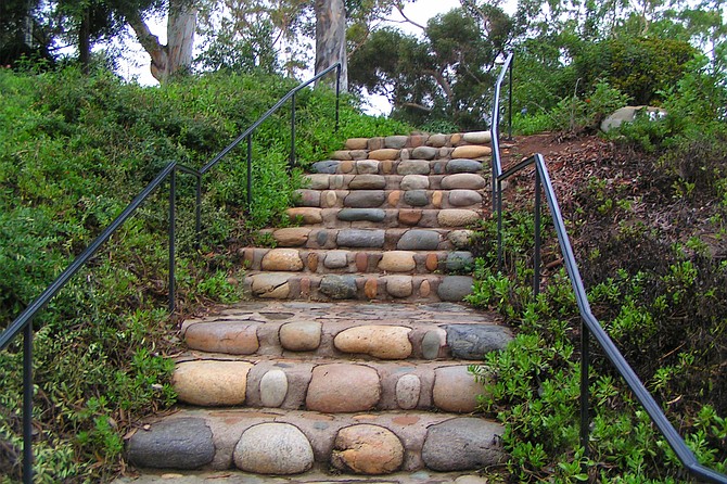 A staircase at the Presidio Park leading down to the museum level.