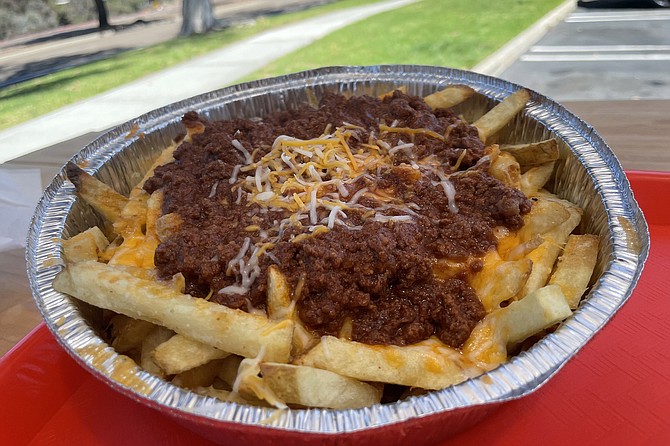A massive plate of chili fries for $7.50