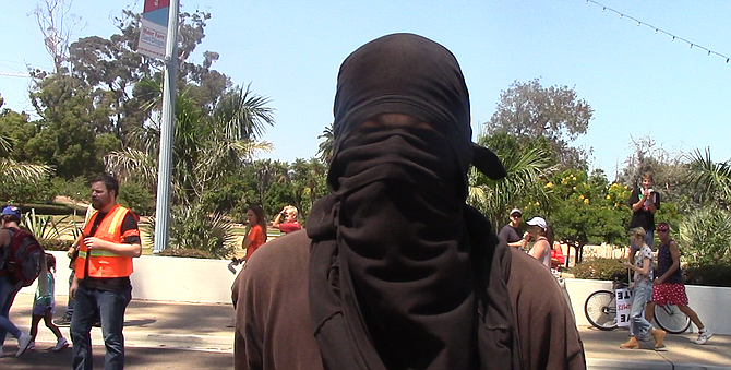 Cannon in his Antifa regalia in a march at Balboa Park in 2017