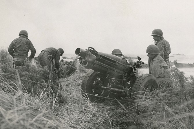 Marines “taking” a beach in Paekakariki around 1943.