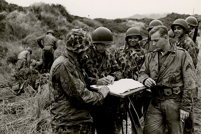 U.S. Marines, First Division, plan mock battle in sandhills of Paekakariki. The real battle was six weeks away.