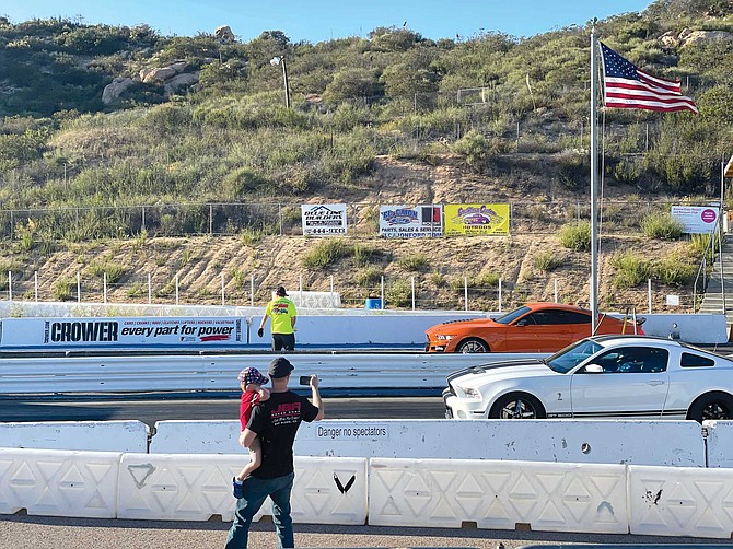The one-eighth mile strip at Barona Drags seems ancient, but the Teslas waiting to race on it are anything but.