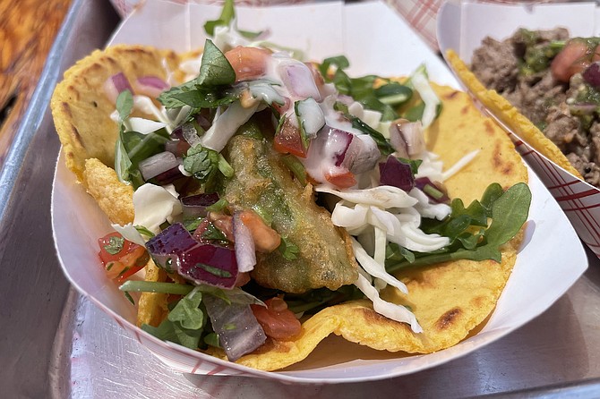 A leafy vegetarian taco, with tempura avocado
