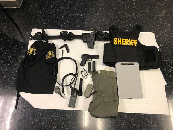 Police collected a black polo shirt with San Diego County Sheriff patches on the shoulders.