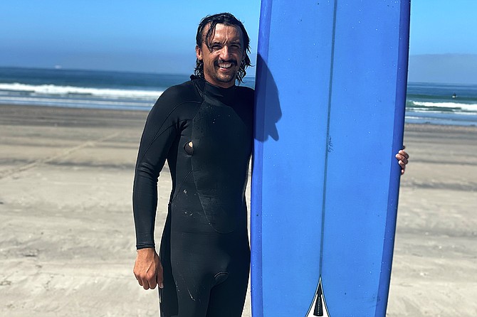 Devon Rosales (29) surfs Coronado Shores