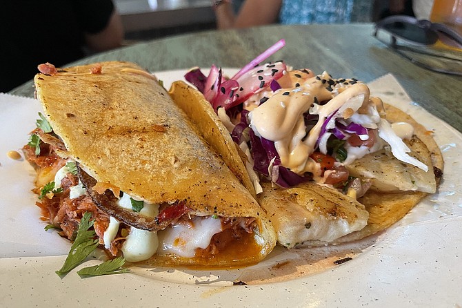 Tacos of smoked marlin (left) and grilled mako shark (right)