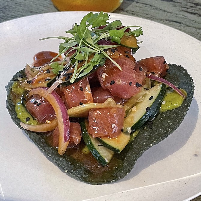"La oriental," an ahi tuna tostada dressed with oyster sauce