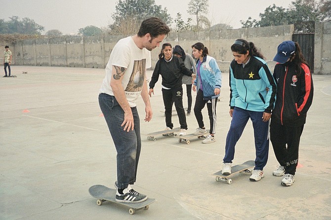 Nestor Judkins takes skateboarding class with girls in Lahore.