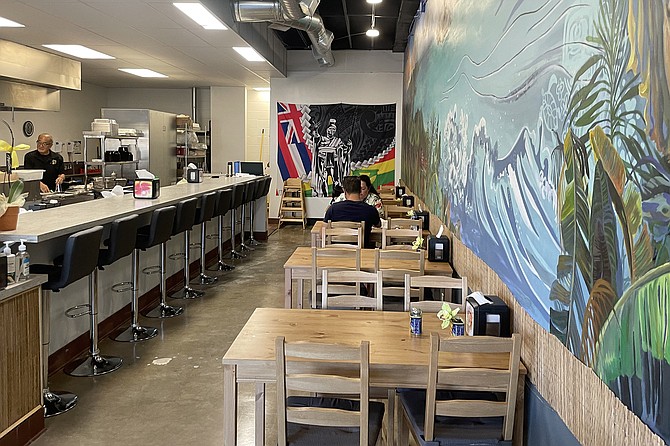"Uncle" Nelson Ishii preps behind his latest lunch counter.