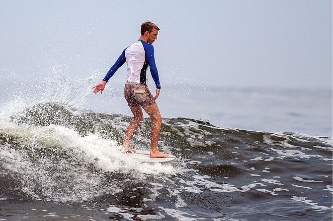 Jackson Giek (17) surfs Sunset Cliffs