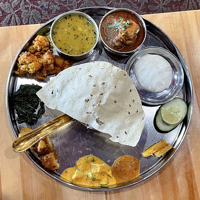 Nepali thali, a traditional plate of food featuring multiple vegetable side dishes