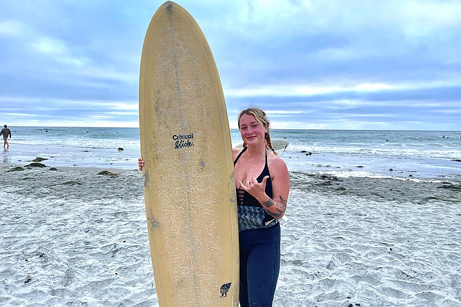 Betty Christensen surfs La Jolla Shores