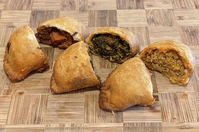 A trio of sambusas: (left to right) stewed vegetables, spinach, and chicken