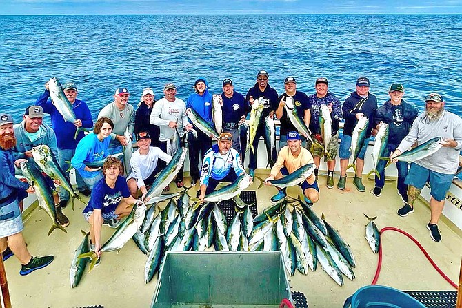 Happy anglers aboard the Constitution with a nice catch of yellowtail and dorado.