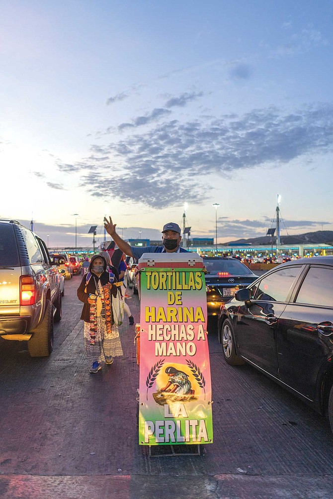 Businesses and people are similar in both the San Ysidro and Otay ports of entry: sellers offering a variety of burritos, Clamatos (seafood cocktails), ice cream, tiger blankets, zarapes (ponchos), flags, unofficial NFL gear and other sports clothing, churros...