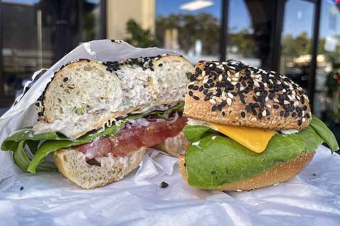 Tuna salad sandwich on an everything bagel