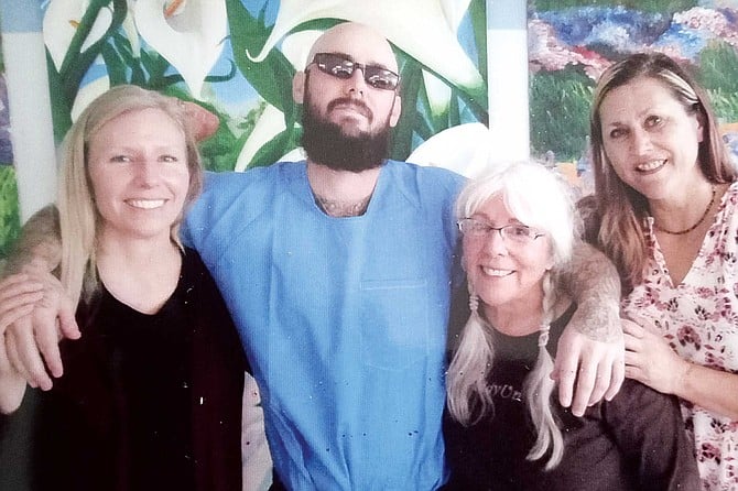 Tommy McCauley is serving life without parole, or LWOP — “a living death.” Pictured here with his aunt Krista, grandmother Amy Robinson, and aunt Martha Kinkade.