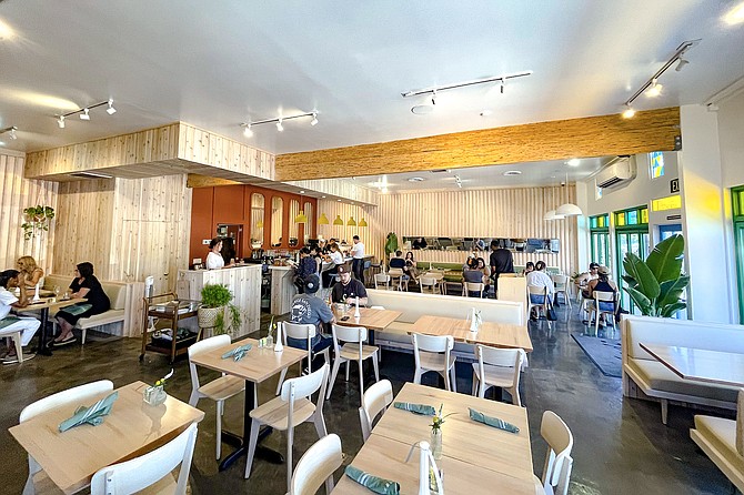 A noisy dining room with rear view mirrors mounted at each end