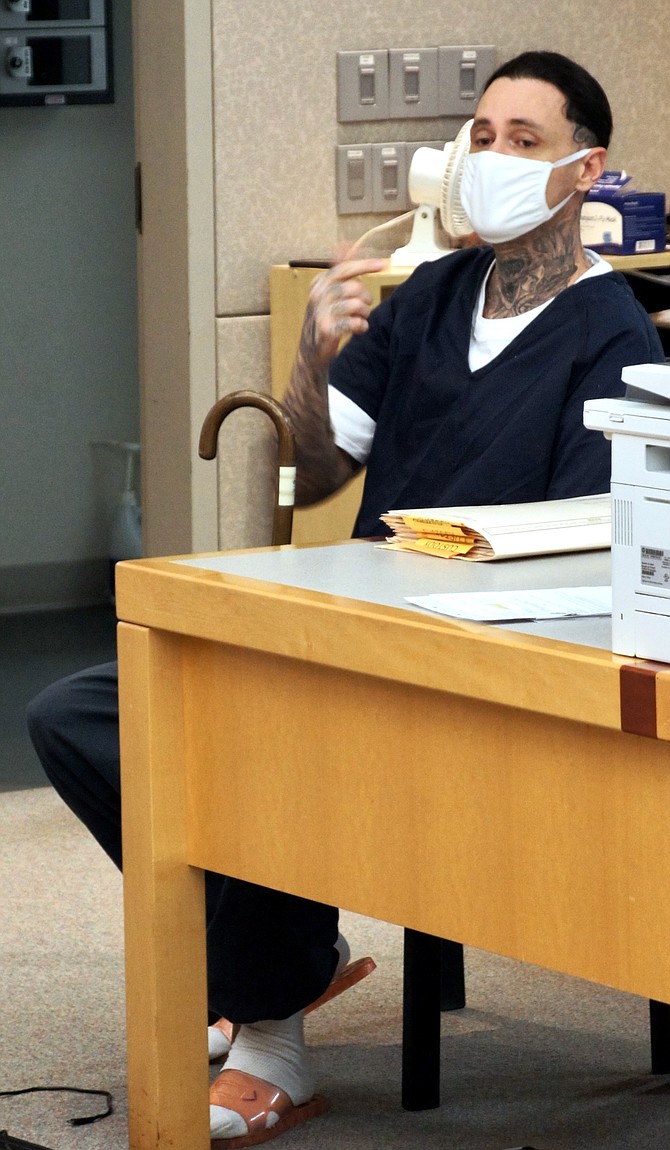 Yach used a cane and limped heavily  at his last court appearance Sept 15. Photo by Eva Knott.