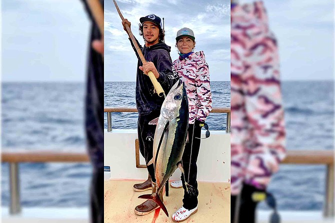 Angler Jessica Sharp with an albacore in the 20-pound range. Once common, this is a rare sight on a San Diego-based boat these days.