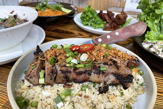Grilled steak over beef tallow fried rice