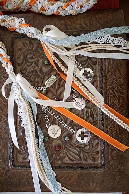 Decorative cords to hand couple’s hands together.