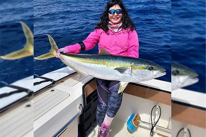Lisa Kitagawa with her line class world record yellowtail caught at San Clemente Island.