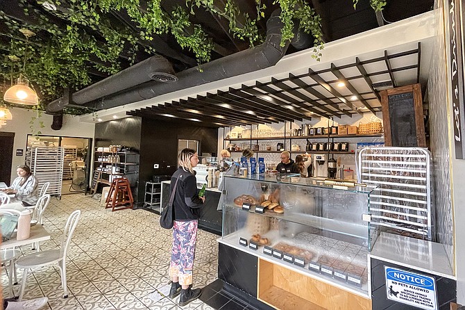 Homage baked goods are served at the café counter at La Clochette du Coin