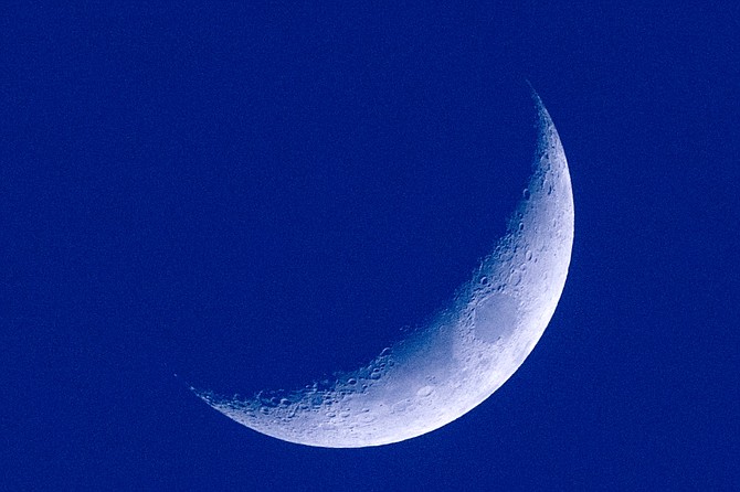 The crescent Moon is always low in the sky and around dawn or dusk, never in darkness.