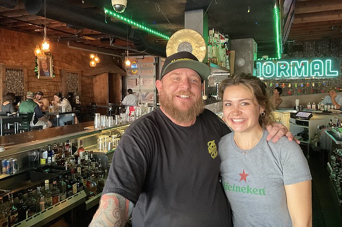 ManagerJosh Blanton with Liz the server: Normal Heights folks are in every day.