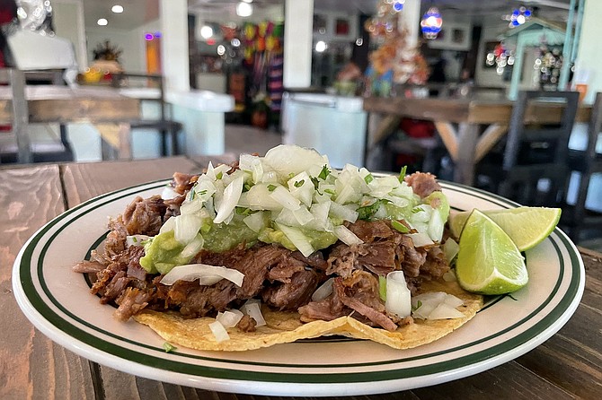 Same beloved Uruapan carnitas, served in a much larger location. This quarter pound carnitas taco goes for $3.50.