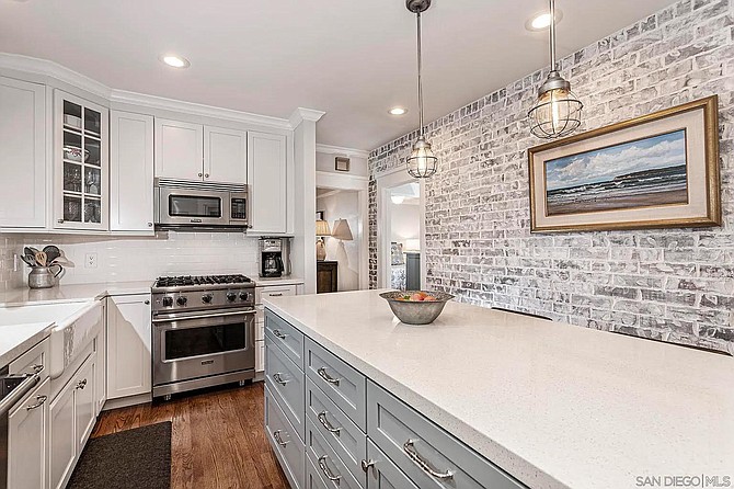 The kitchen island is an island in the way that Australia is an island. But it works!