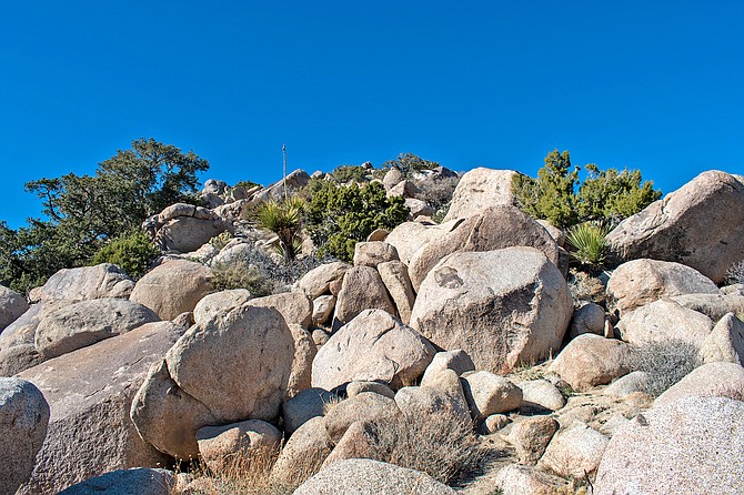 Scrambling up granite boulders