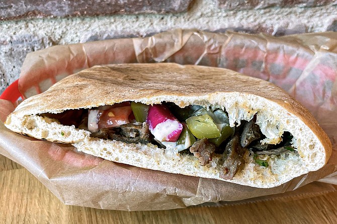 The O.G. Pita from Tahini, featuring Syrian style steak shawarma