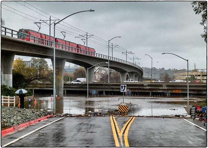 Hazard Center Drive lanes from Fashion Valley get thirteen feet of water