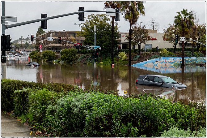 Submerged vehicles on Mission Center Drive