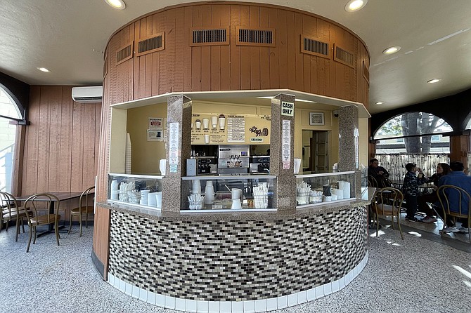 A round yogurt counter, inside a round building