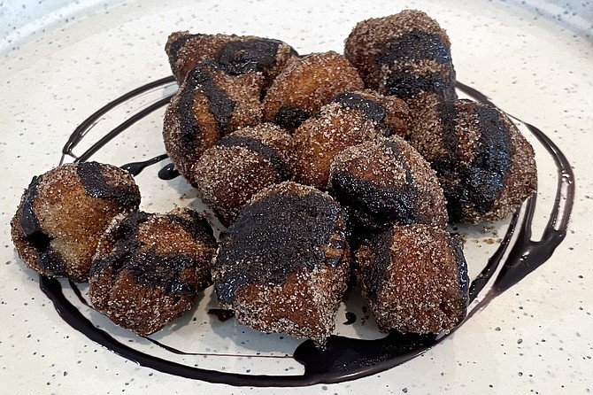 Portuguese by way of Pacific Islands fried dough treats called malasadas