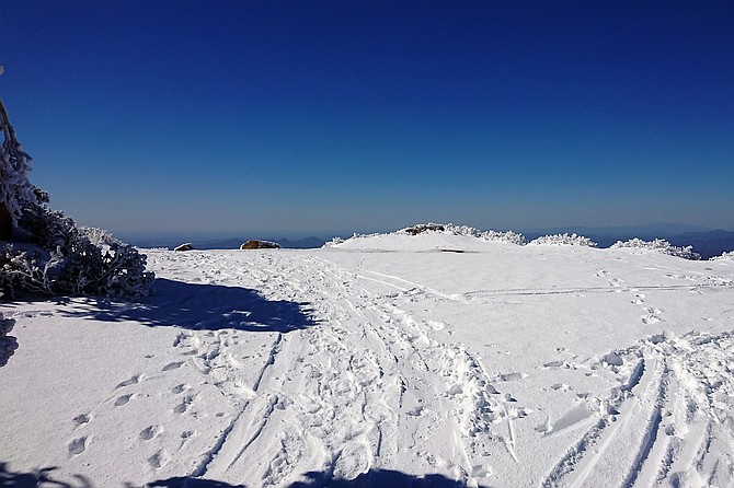 The plateau that marks the peak.