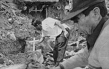 Rubén Lopez Moreno (foreground) and Jorge Tovar at scene of mudslide, February 1998