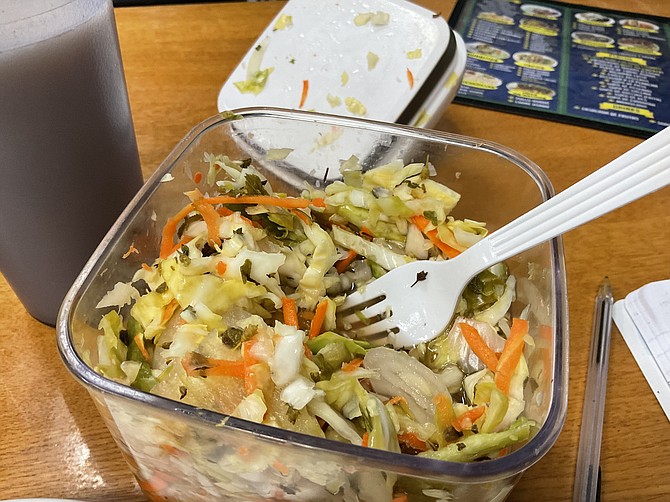 Curtido, the fermented salad, is a mouth refresher for pupusa eaters.