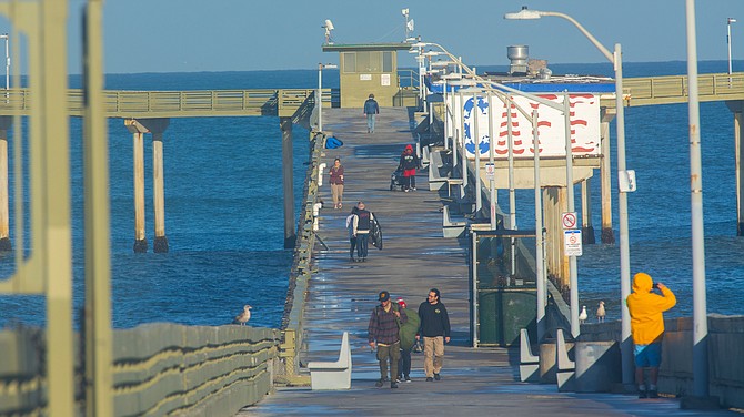Grant noticed nearly a dozen people walking along the almost 2,000-foot pier.