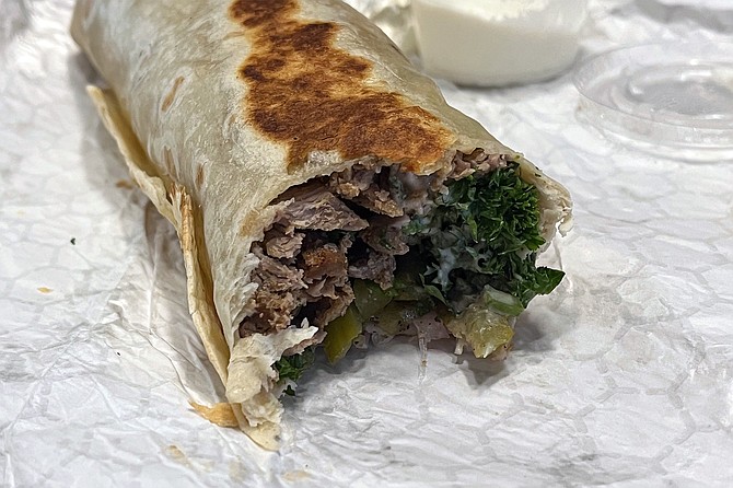 Wagyu's shawarma benefits from salty pickles, refreshing bite of parsley, toothsome flatbread, and liberal handouts of tahini and garlic sauce.