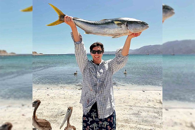 A very happy angler with a quality yellowtail caught while fishing with Tuna Fishing Company out of Ensenada de los Muertos in southern Baja.