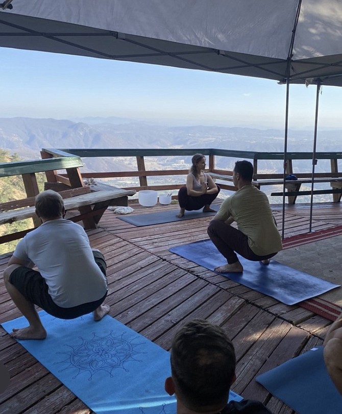 The hour-long class is led by a certified yoga instructor who makes sure our physical bodies are grounded and centered before accepting the psilocybin sacrament.