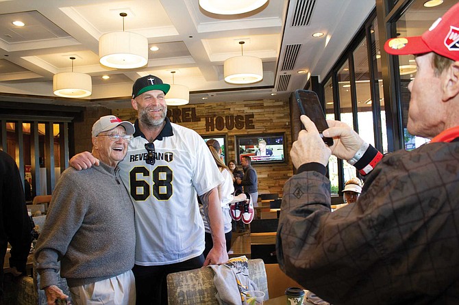 Kyle Turley (center) with fans at the Gridiron Greats Celebrity Golf Classic.